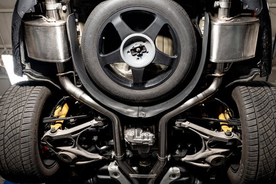 2.75 Inch Dual Rear Exit Cat-Back Exhaust System with Single 4.5 Inch Black PVD Pro Series Tips S...