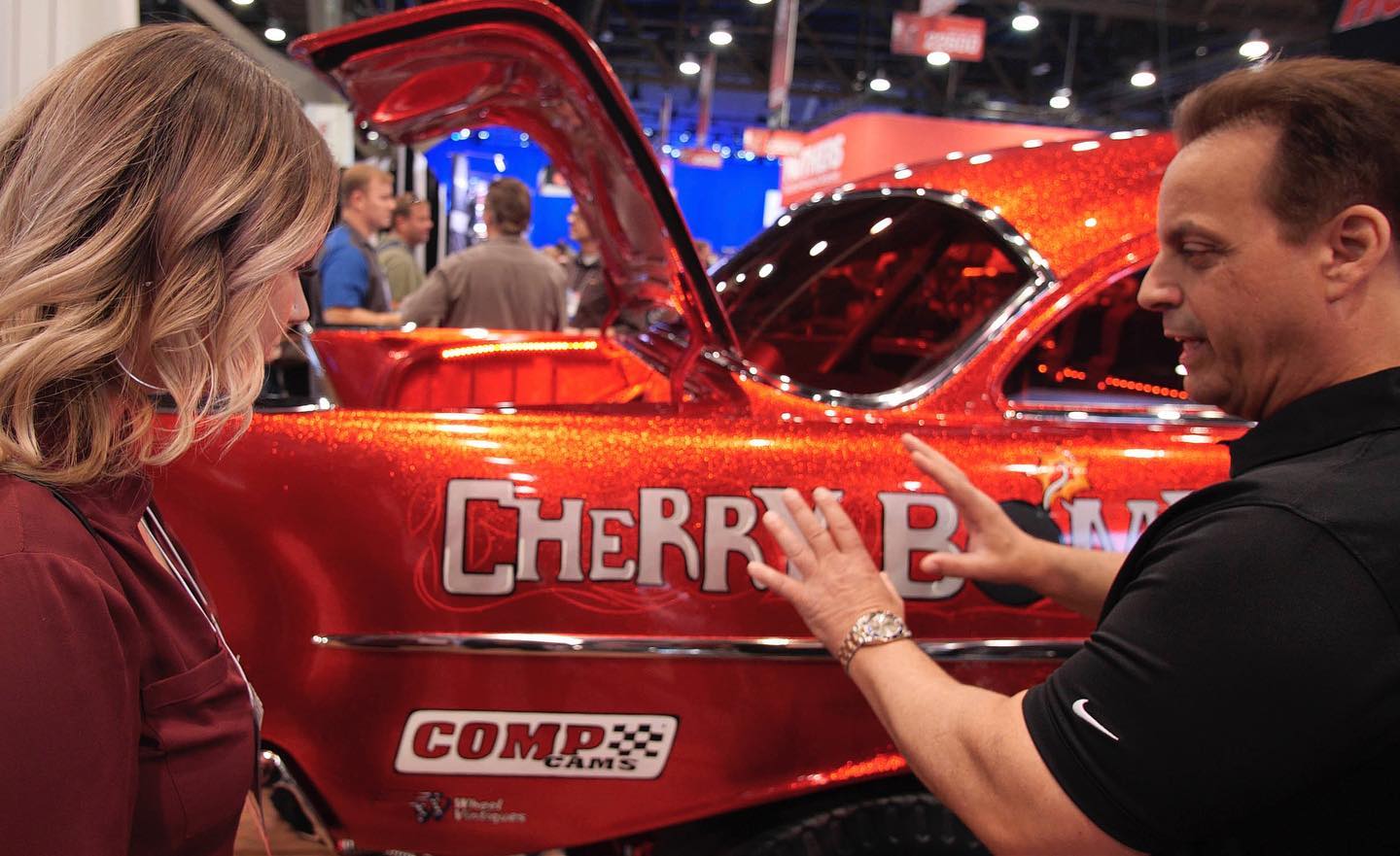 Members of the Tint World team check out automotive industry innovations at SEMA