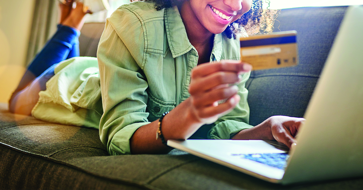 Woman uses e-commerce to purchase from a franchise.